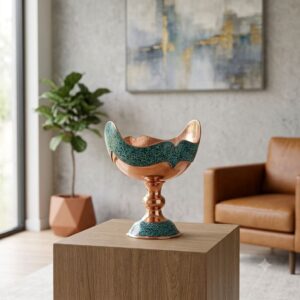 Turquoise inlaying Kashkool centerpiece displayed on a wooden pedestal block.