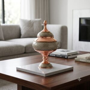 Handmade Persian Khatamkari marquetry candy dish on marble tile atop a wooden coffee table.