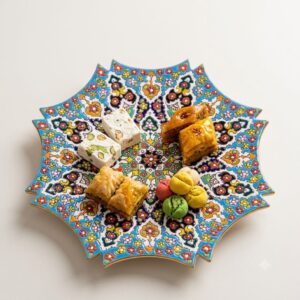 Overhead view of octagonal jewel pottery dish with assorted sweets.