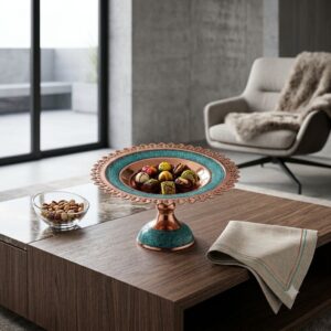 Turquoise inlaying serving dish with chocolates on a modern coffee table.