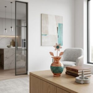 Modern living room credenza styled with a miniature copper flower vase and turquoise stone inlay.